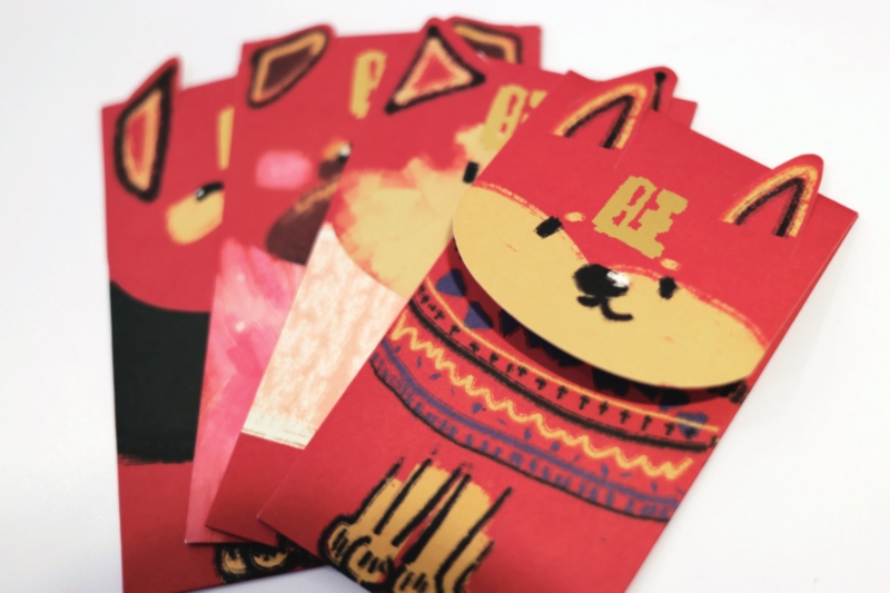 　　杨文丹团队设计的狗年文创红包。